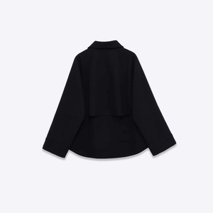 Women's black cropped wool jacket featuring a stylish storm flap back and loose fit