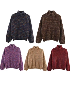 Flat lay display of five chunky knit sweaters in various colors on white background
