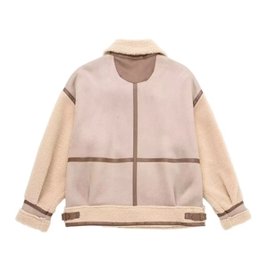 Women's beige shearling biker jacket with stylish brown leather patchwork on the back