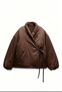 Deep brown quilted wrap jacket with tie closure and kimono style collar detail