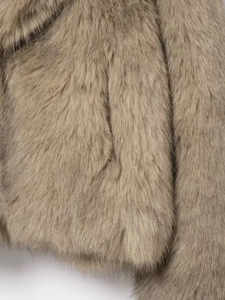 Detail of the soft, long-haired faux fur fabric on this warm autumn winter coat