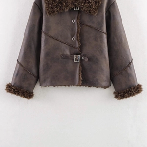 Women's vintage dark brown faux shearling jacket with biker style buckle detail