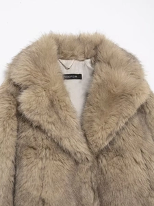 Detailed view of camel faux fur texture and lapel collar on the Indefeir winter coat