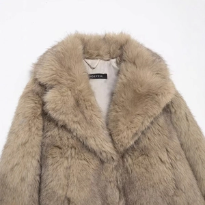 Plush light brown faux fur coat with oversized lapels and soft gray inner lining