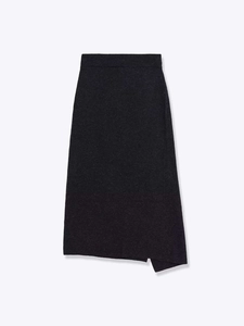 Detail of dark grey knit midi skirt with an asymmetric hem and dense fabric texture