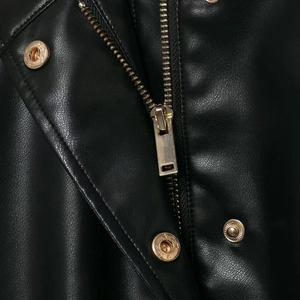 Faux leather jacket with gold zipper and decorative snap buttons in black finish