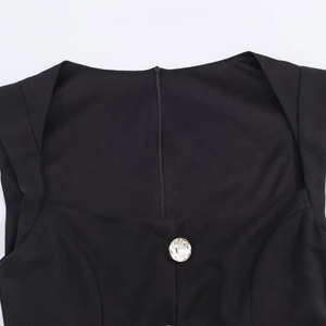 Women's slim fit black romper with square neckline and luxury crystal button detail