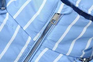 Close-up of the smooth metal zipper on this blue and white striped hooded jacket