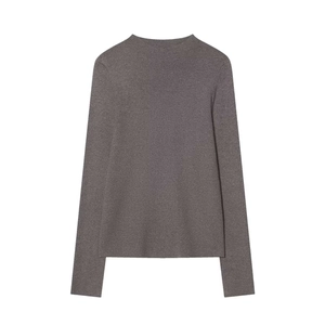 Close-up of dark grey ribbed knit sweater featuring a round neck and long sleeves