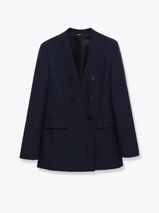 Vue détaillée d'un blazer bleu marine à double boutonnage avec poches à rabat