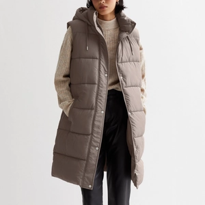 Long hooded quilted vest in taupe with zipper closure and drawstring hood for women
