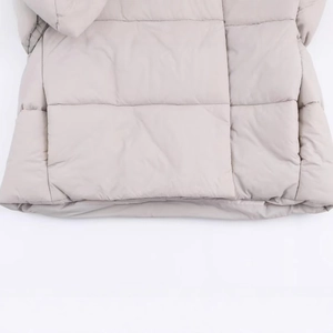 Women's light grey winter puffer jacket featuring stylish square quilting and warm padded design