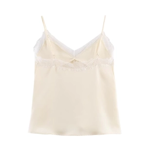 Detail of elegant cream satin camisole showing delicate lace trim and smooth fabric texture