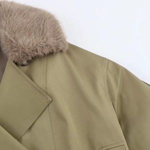 Close-up of khaki green jacket featuring a soft light brown faux fur collar and twill fabric