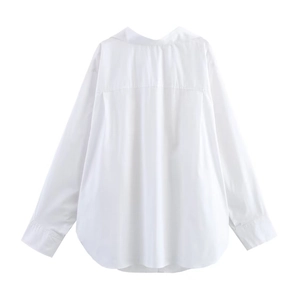Rear view of a white oversized long-sleeve shirt featuring a curved hem and back yoke seam