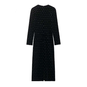 Elegant black velvet midi dress featuring a sparkling silver sequin grid and long sleeves