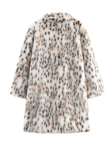 Macro view of leopard print faux fur texture on a white long plush coat for women