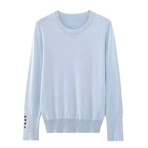 Slim fit light blue long sleeve knit sweater for women with gold button sleeve details