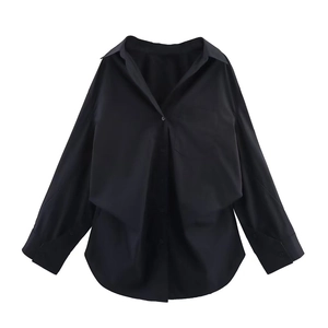 Detail view of black long sleeve shirt featuring a double-layered front and polo collar