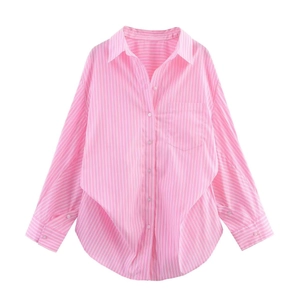 Detail of pink striped shirt showing lapel collar, buttons, and layered hem design