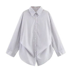 Detail of light blue striped long sleeve shirt with front buttons and curved hemline