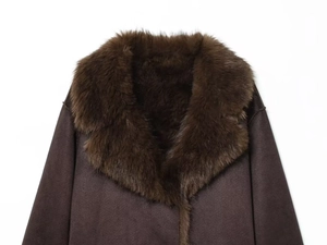 Detail of dark brown faux suede jacket featuring thick faux fur collar and warm lining