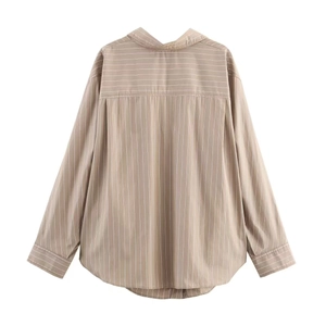 Detail of khaki striped shirt showing contrast horizontal yoke and vertical pattern back