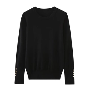 Slim-fit black crewneck knit sweater with decorative buttons on sleeves and cuffs