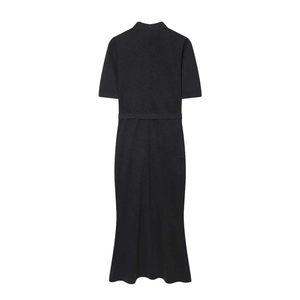 Close-up of black slim fit short sleeve dress featuring high neck and waist belt detail