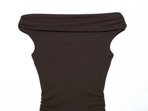 Detail of dark brown off-shoulder knit top featuring elegant side ruched pleats and texture