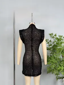 Detail of slim-fit black sequin bodycon dress with high neck and sleeveless design