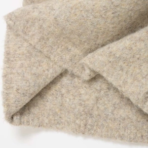 Chic oatmeal knitted high-waisted skirt with warm thick wool texture for autumn
