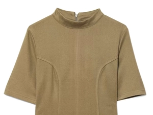 Detail of khakigreen standing collar dress featuring back zipper and textured fabric