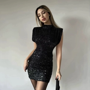 Sleeveless black sequin mini dress with shoulder pads and a slim fit chic design
