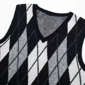 Classic V-neck argyle knitted dress featuring black and grey diamond pattern textures