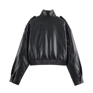 Rear view of black faux leather cropped jacket with stand collar and elastic hemline