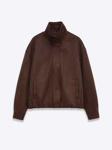 Close-up detail of dark brown faux suede jacket with stand collar and matte texture