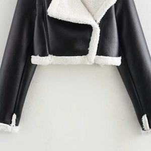Women's black faux leather aviator jacket with white faux fur collar and trim detail