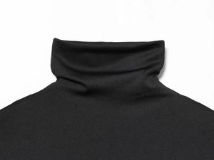 Detail shot of black turtleneck collar with premium knit fabric and neat stitching