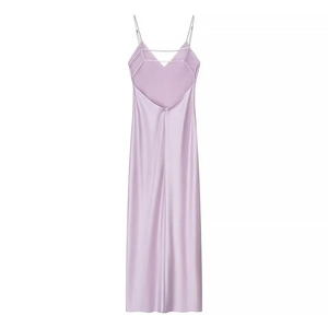 Detail of lavender satin midi dress featuring an open back and adjustable thin straps