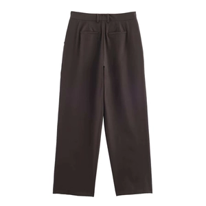Detail view of high-waist wide-leg trousers in dark brown with rear welt pockets