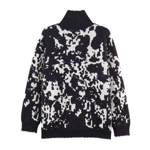 Relaxed high neck knit sweater with black and white pixelated jacquard pattern