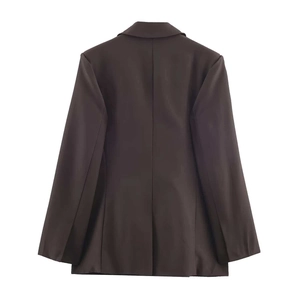 Rear view of a chocolate brown double-breasted blazer with back vent and structured shoulders