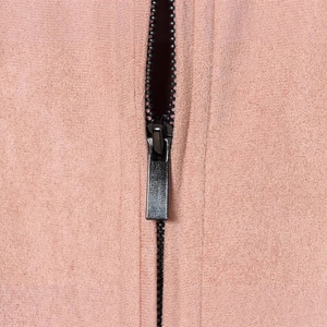 Pink faux suede jacket with black metal zipper detail and fine fabric texture for women