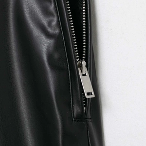 Fashionable black PU faux leather flare pants featuring a silver metal zipper detail