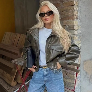 Vintage olive brown faux leather jacket with oversized pockets in high-end streetwear style