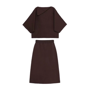 Women's dark brown two-piece knit set featuring short sleeve lapel top and midi skirt