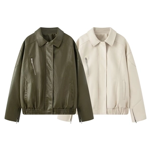 Detailed close-up of oversized PU leather bomber jackets in olive green and beige colors