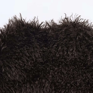 Vintage dark brown curly faux fur coat for women with rich plush texture and thick fibers