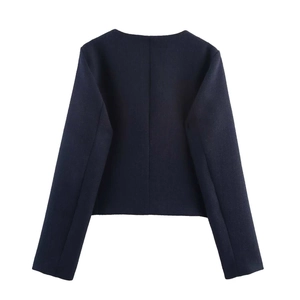 Back view of a navy blue tweed jacket featuring a cropped cut and round neckline